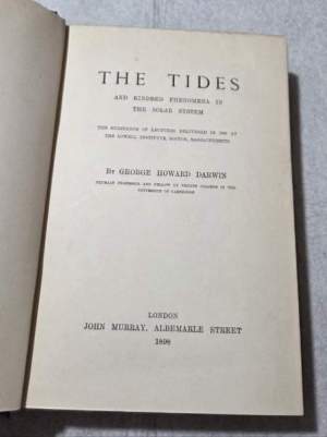 The tides and kindred phenomena in the solar system